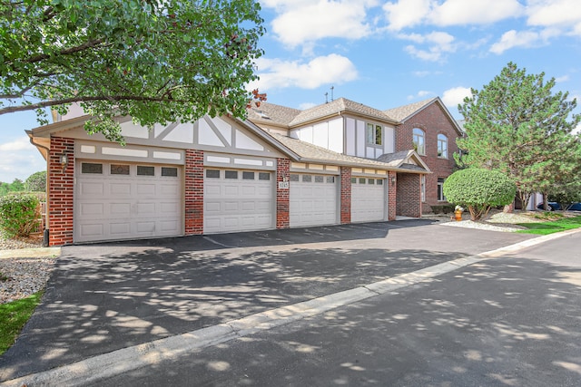 tudor home with a garage