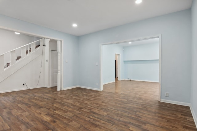 empty room featuring dark hardwood / wood-style floors