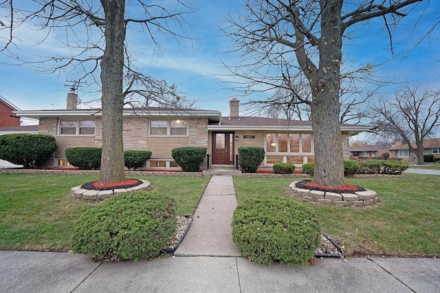 view of front of home with a front yard