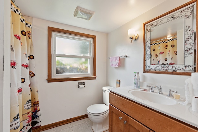 bathroom with vanity, tile patterned flooring, and toilet