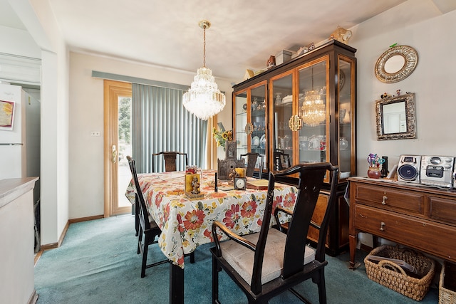 dining room featuring carpet floors and a notable chandelier