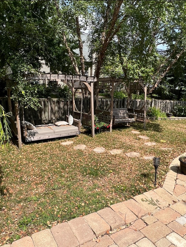 view of yard featuring a wooden deck