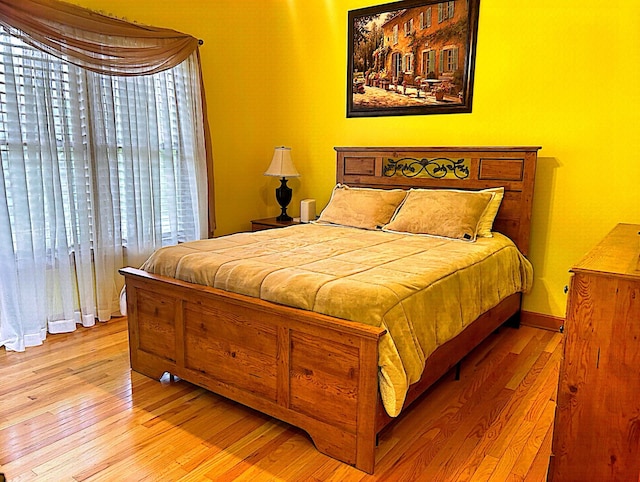 bedroom featuring hardwood / wood-style flooring