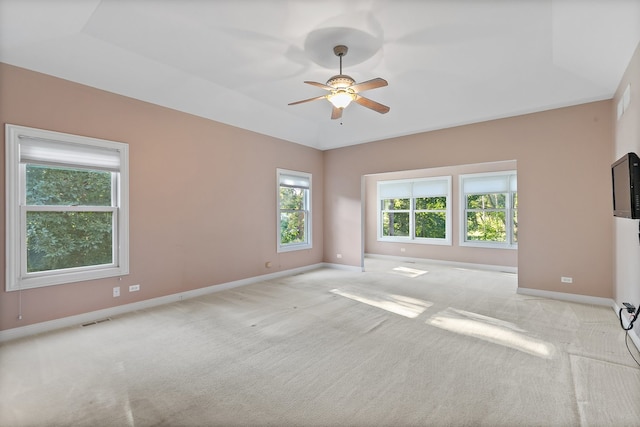 carpeted empty room with ceiling fan