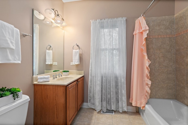 full bathroom with vanity, shower / tub combo with curtain, toilet, and tile patterned floors