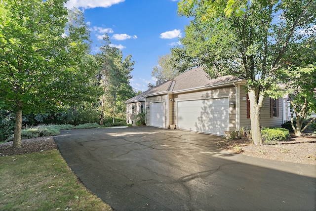 exterior space with a garage