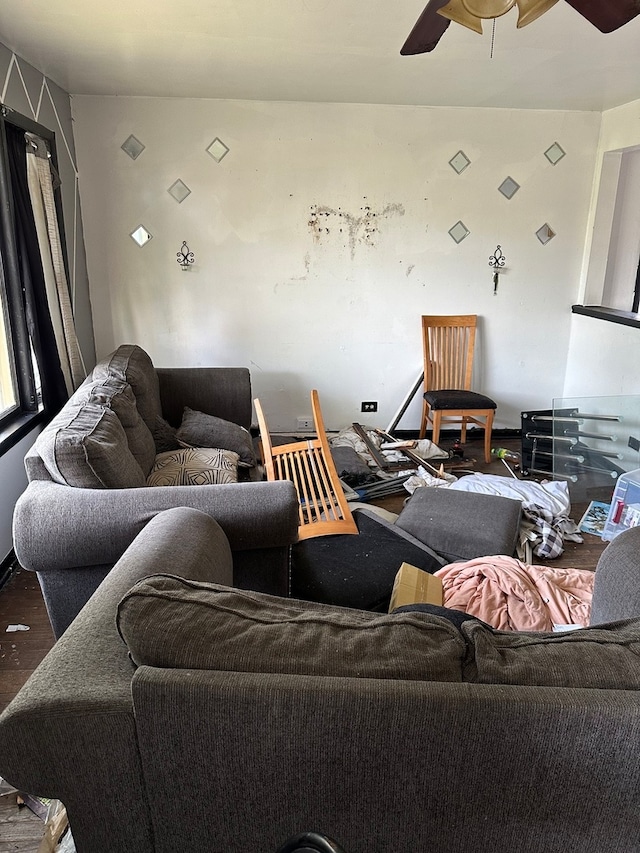 living room featuring ceiling fan and wood-type flooring