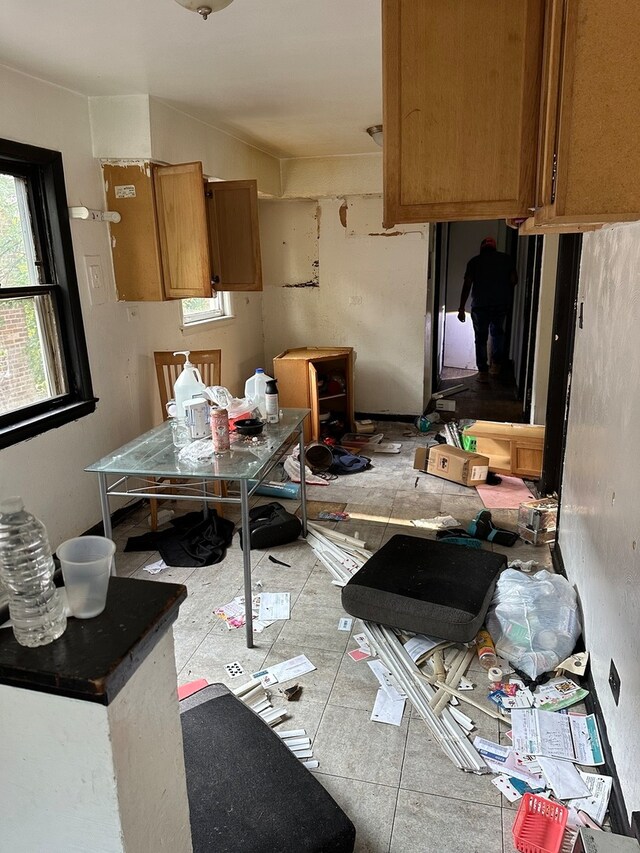 kitchen with light tile patterned flooring