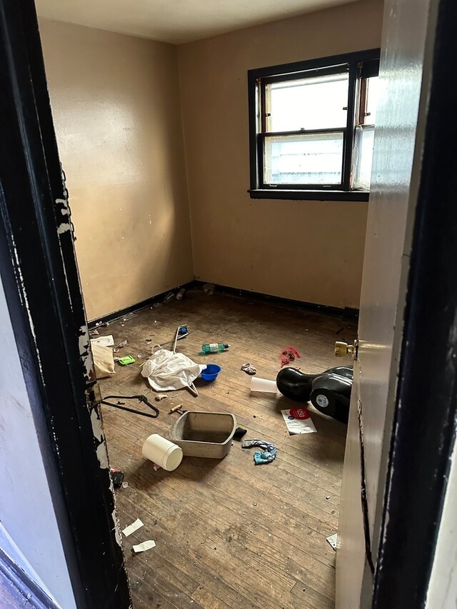 empty room featuring hardwood / wood-style flooring