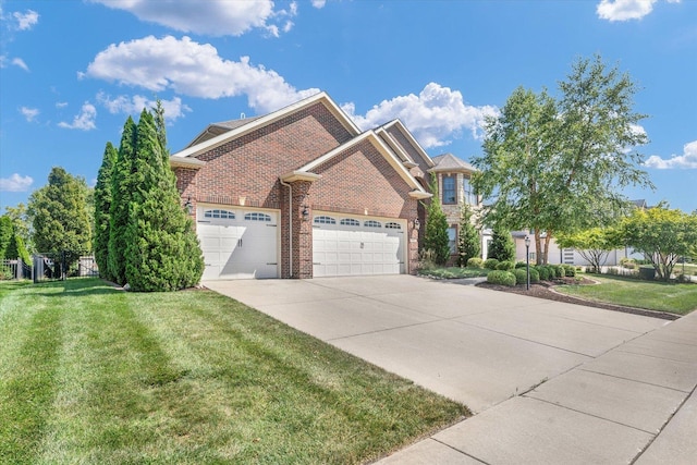 view of front of house with brick siding, a front lawn, concrete driveway, and an attached garage