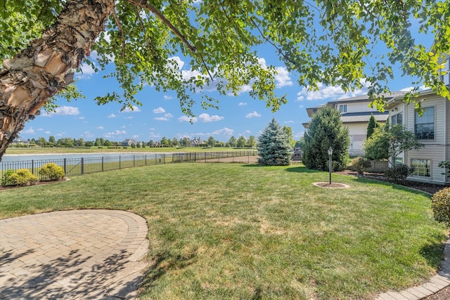 view of yard with a water view