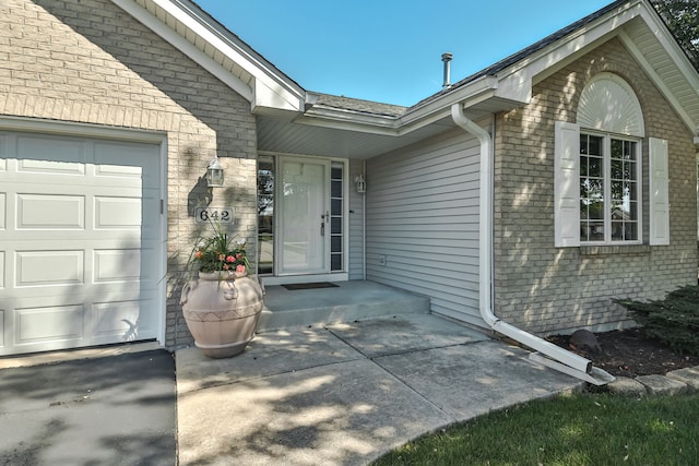 property entrance featuring a garage