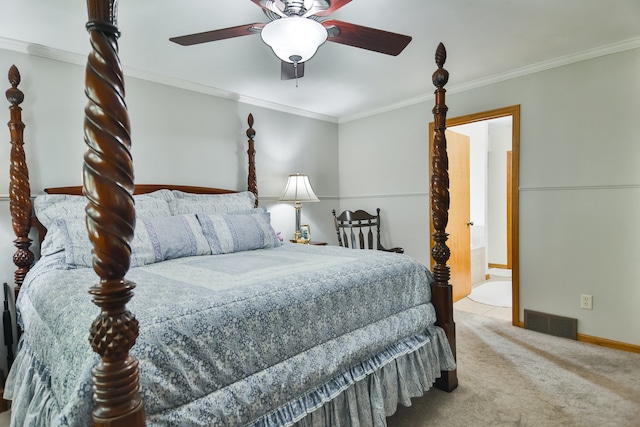 carpeted bedroom with crown molding, ensuite bath, and ceiling fan