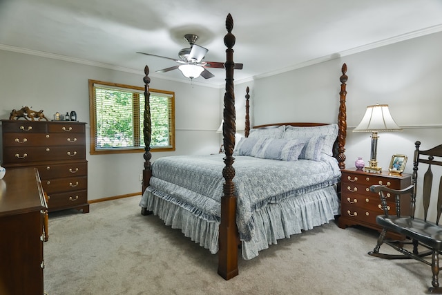 bedroom with ceiling fan, light colored carpet, and ornamental molding