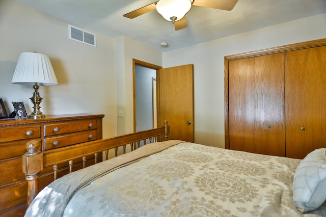 bedroom featuring ceiling fan and a closet