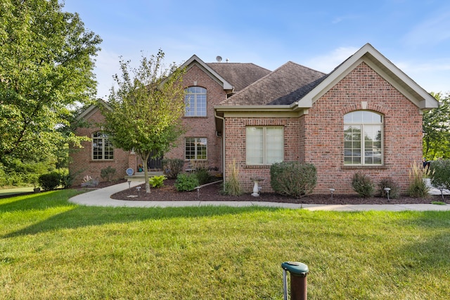 view of property with a front lawn