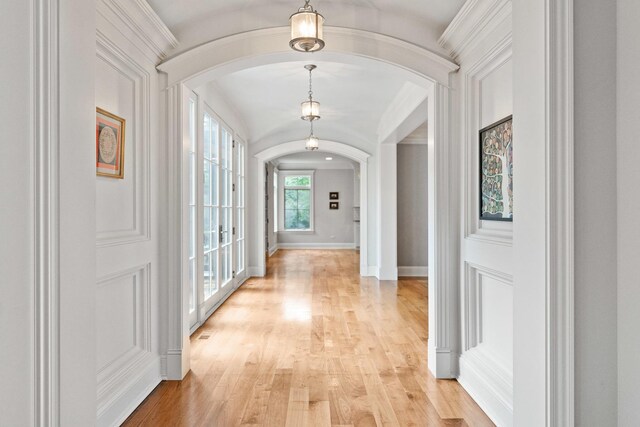 corridor with light wood-type flooring