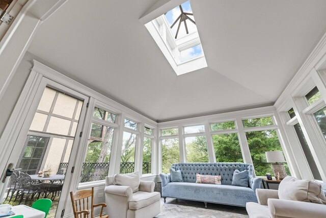 sunroom / solarium featuring plenty of natural light and a skylight