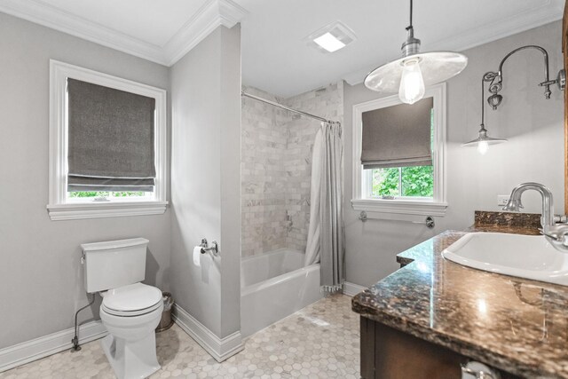 full bathroom with vanity, toilet, ornamental molding, and shower / bath combo