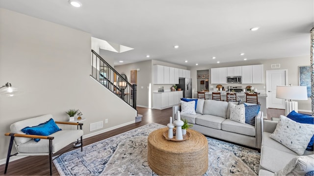 living room with dark wood-type flooring