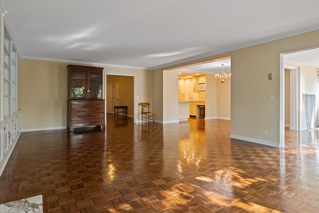 interior space with a notable chandelier, crown molding, dark parquet floors, and sink