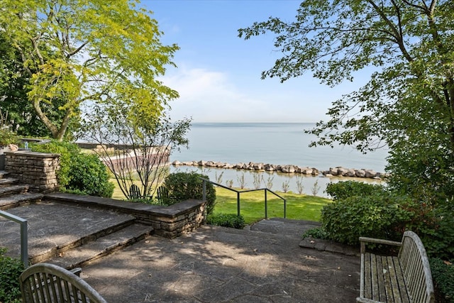 view of patio / terrace with a water view