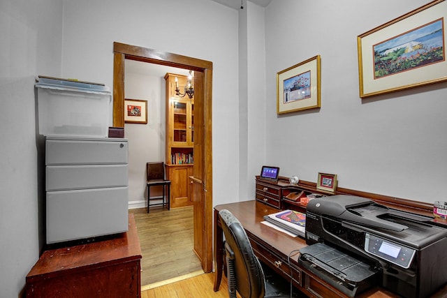 home office featuring light wood-style flooring