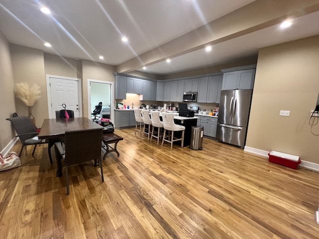 dining room featuring light hardwood / wood-style flooring