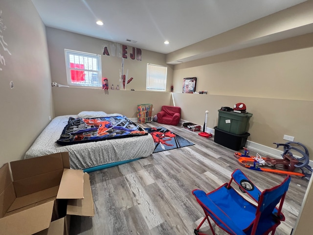 bedroom featuring hardwood / wood-style floors