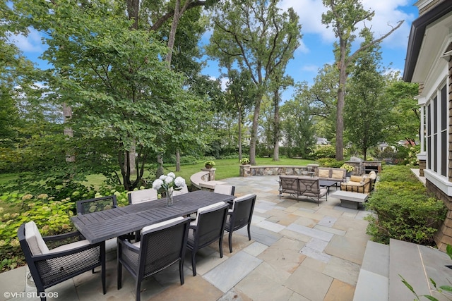 view of patio featuring a fire pit and a grill