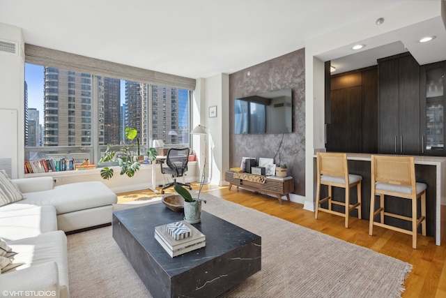 living room featuring light hardwood / wood-style floors