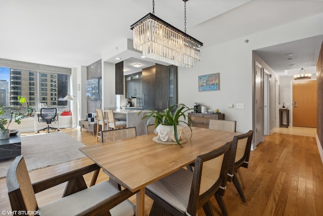 dining area featuring wood-type flooring