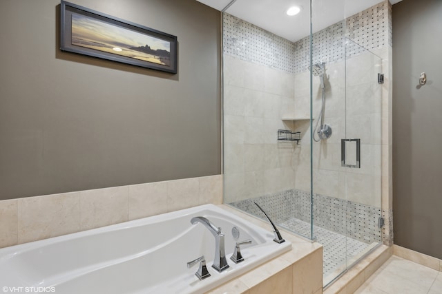 bathroom with plus walk in shower and tile patterned floors