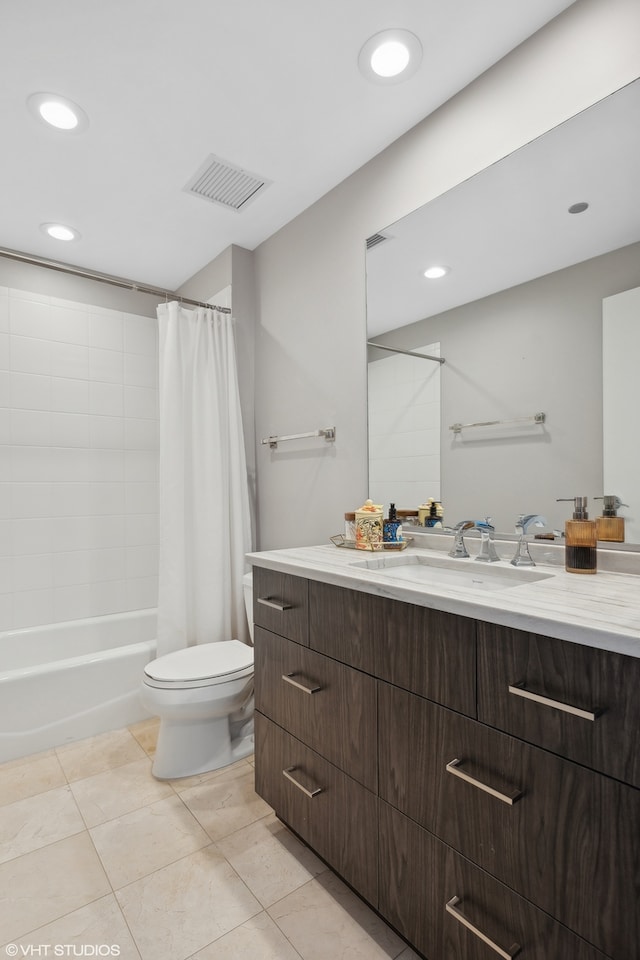 full bathroom featuring vanity, toilet, shower / tub combo, and tile patterned floors