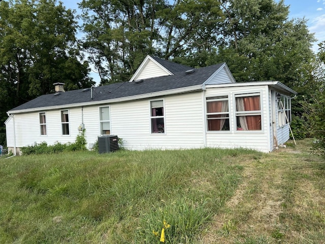 back of property with cooling unit