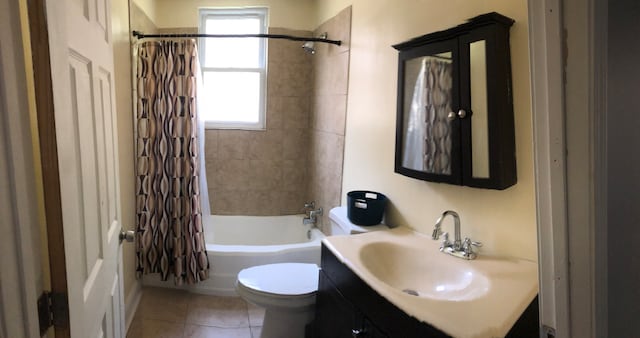 full bathroom with vanity, toilet, plenty of natural light, and shower / bath combo with shower curtain