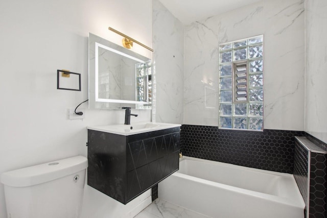 full bathroom featuring marble finish floor, vanity, and toilet