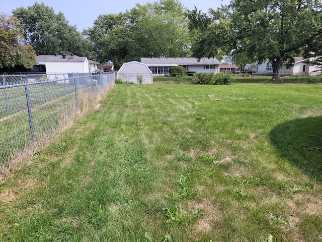 view of yard with a shed