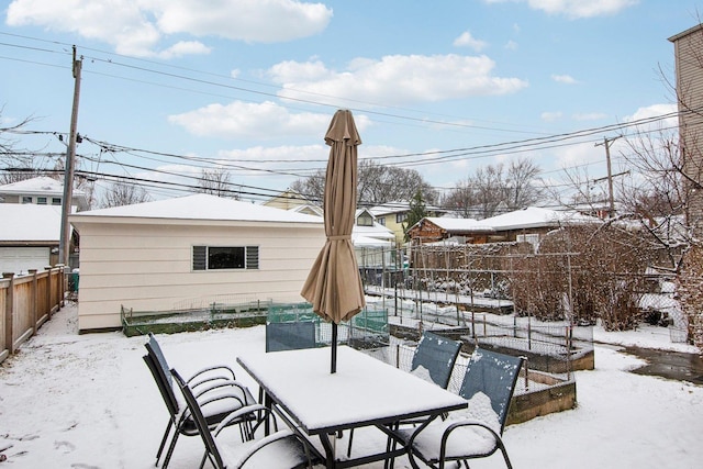 view of snow covered patio