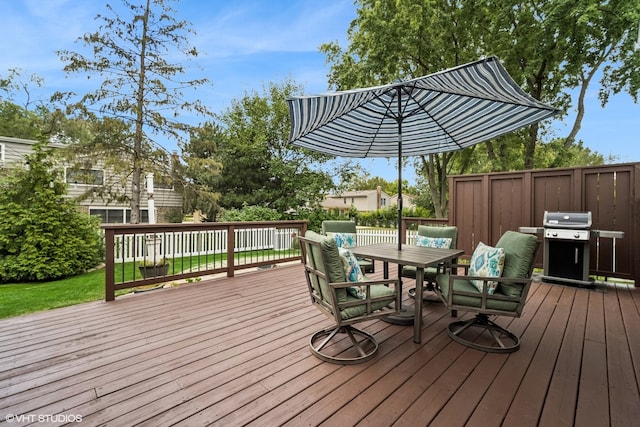 wooden deck with area for grilling