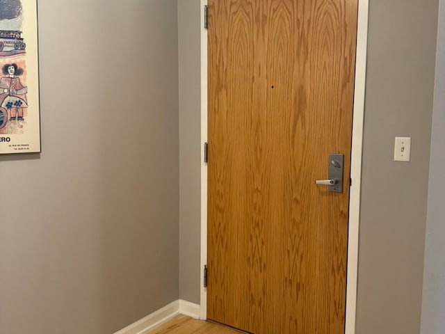 entryway with light hardwood / wood-style flooring