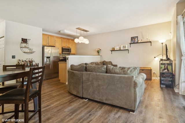 living room featuring dark hardwood / wood-style floors