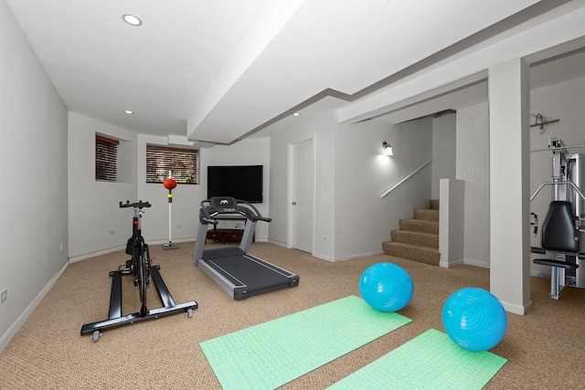 exercise area featuring carpet