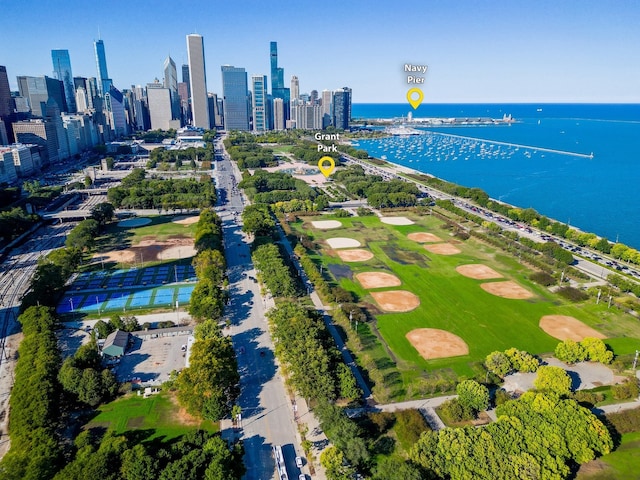 birds eye view of property featuring a water view