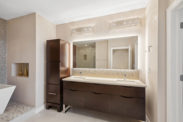 bathroom with vanity, independent shower and bath, tile patterned floors, and backsplash