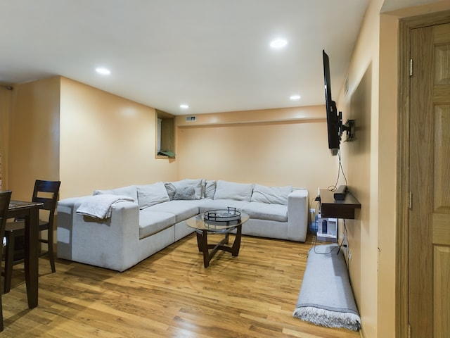 living room with light hardwood / wood-style floors