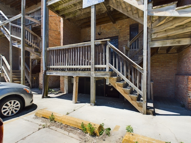 exterior space with brick wall