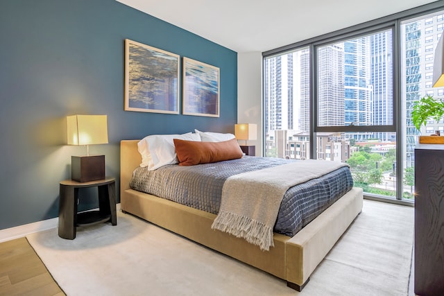211 N Harbor Dr Unit 805, Chicago, IL 60601 - bedroom featuring light wood-type flooring and floor to ceiling windows