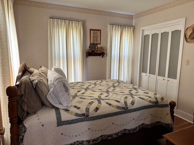 laundry area with cabinets, a textured ceiling, light tile patterned flooring, and washing machine and dryer