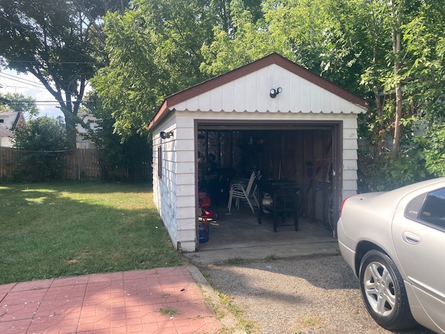 garage with a lawn